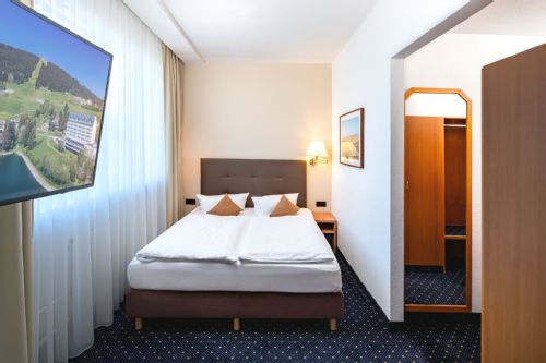 Hotel Motive, Zimmer, Doppelzimmer, Deluxe Zimmer Schlafbereich